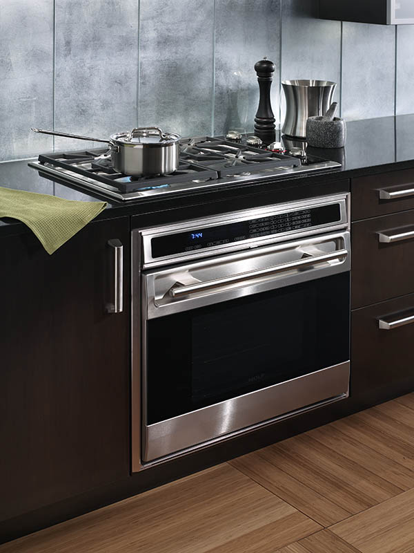 Gas cooktop with electric oven below
