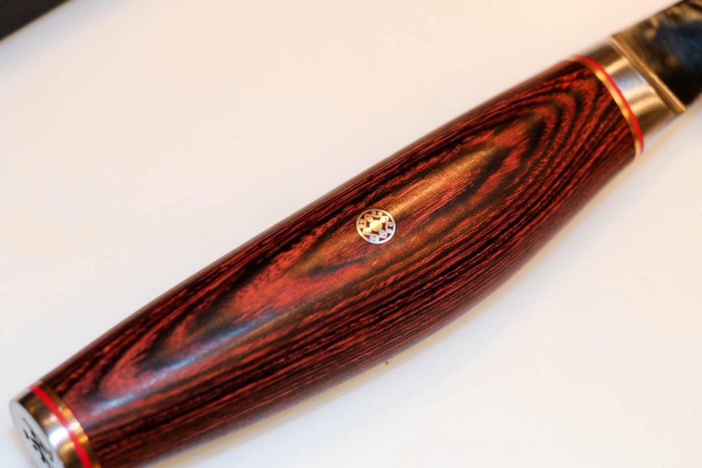 Inlay details are stunning, as is the finish work on the handle.